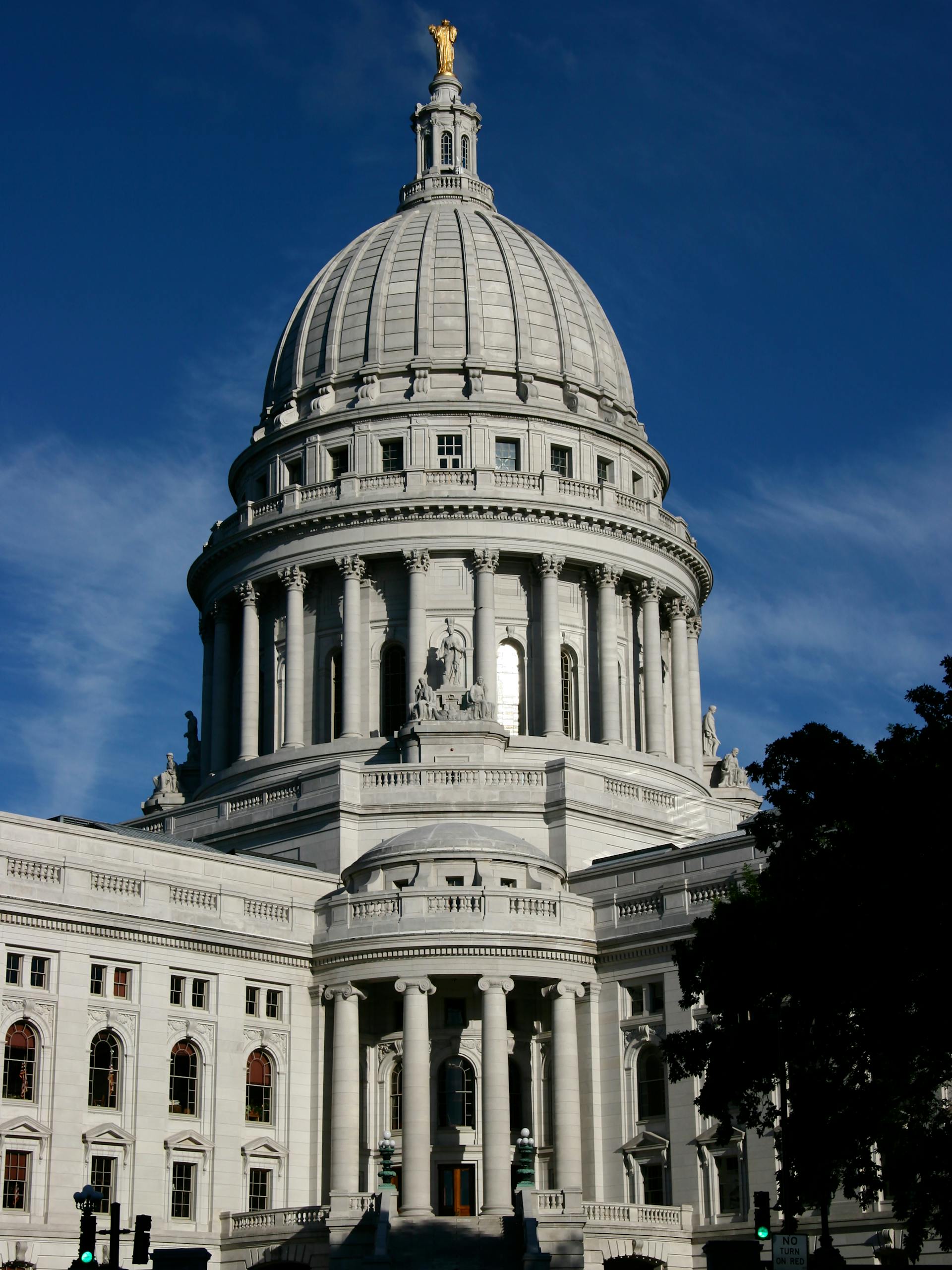 Iconic dome of the Wisconsin State Capitol in Madison on a clear day.